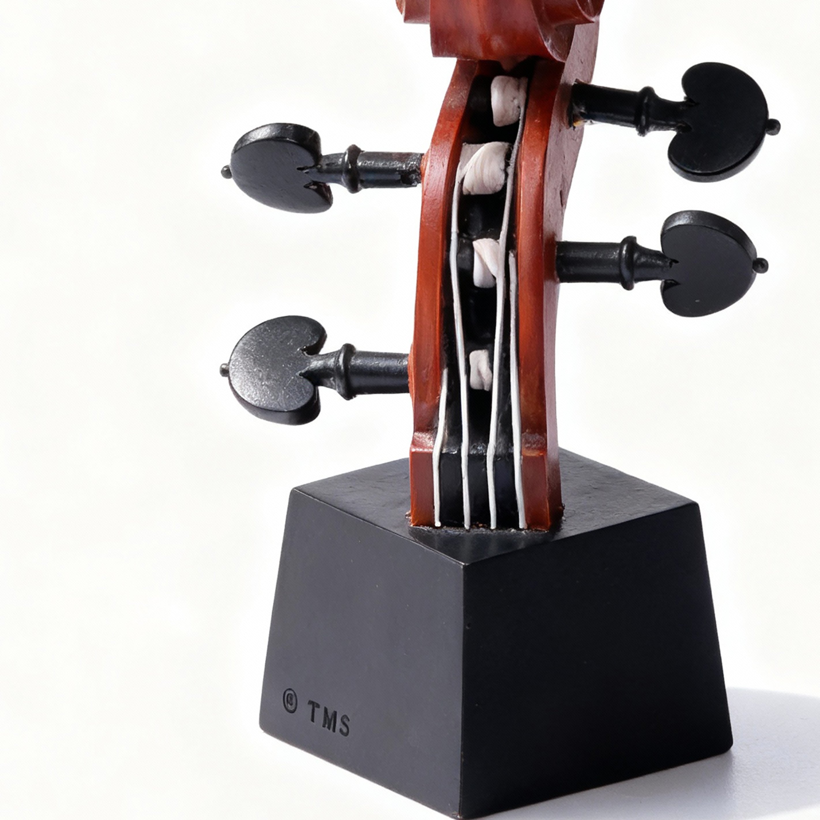 The Merchant Source. Violin Shaped Sculpture. Medium Size