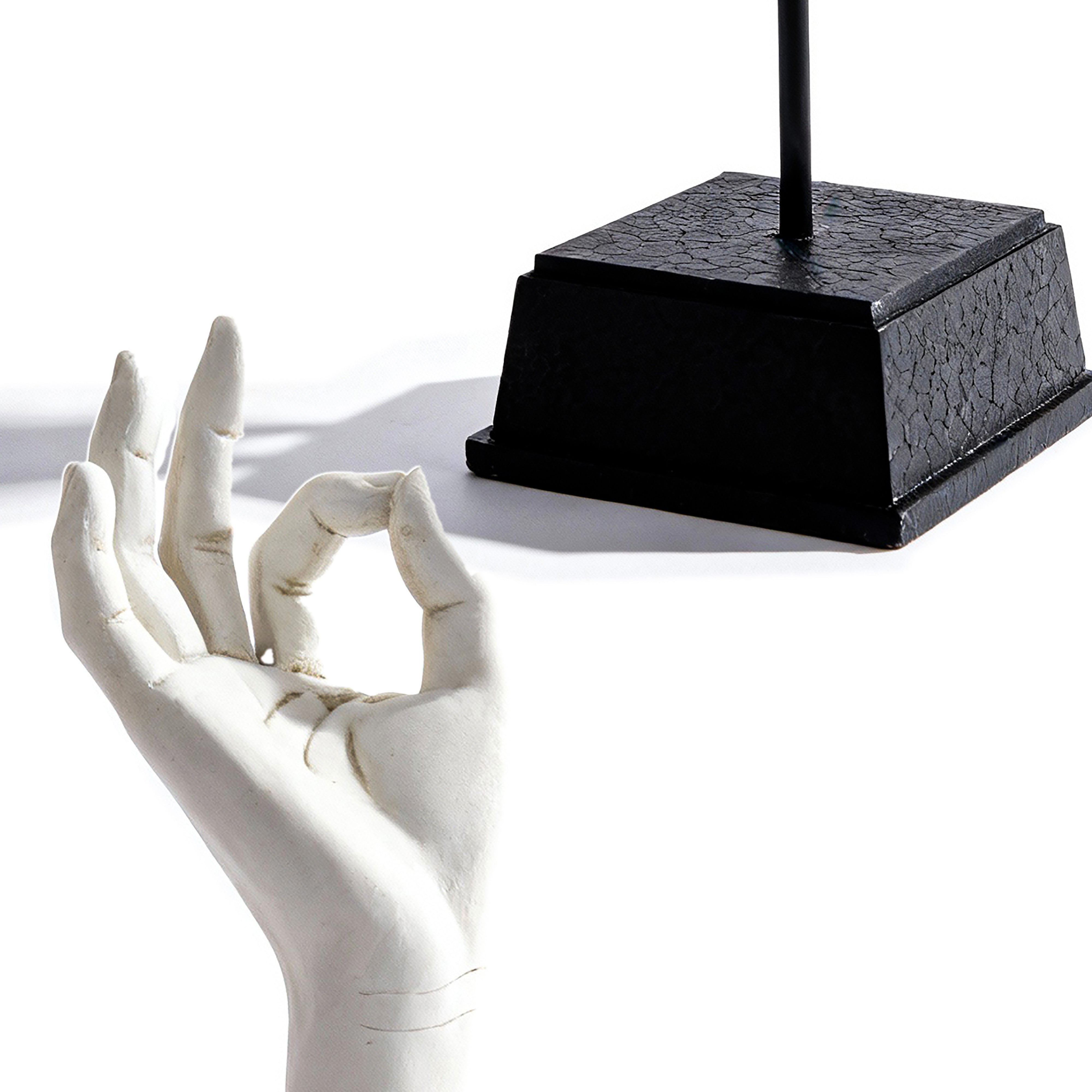 The Merchant Source. White Hand Sculpture