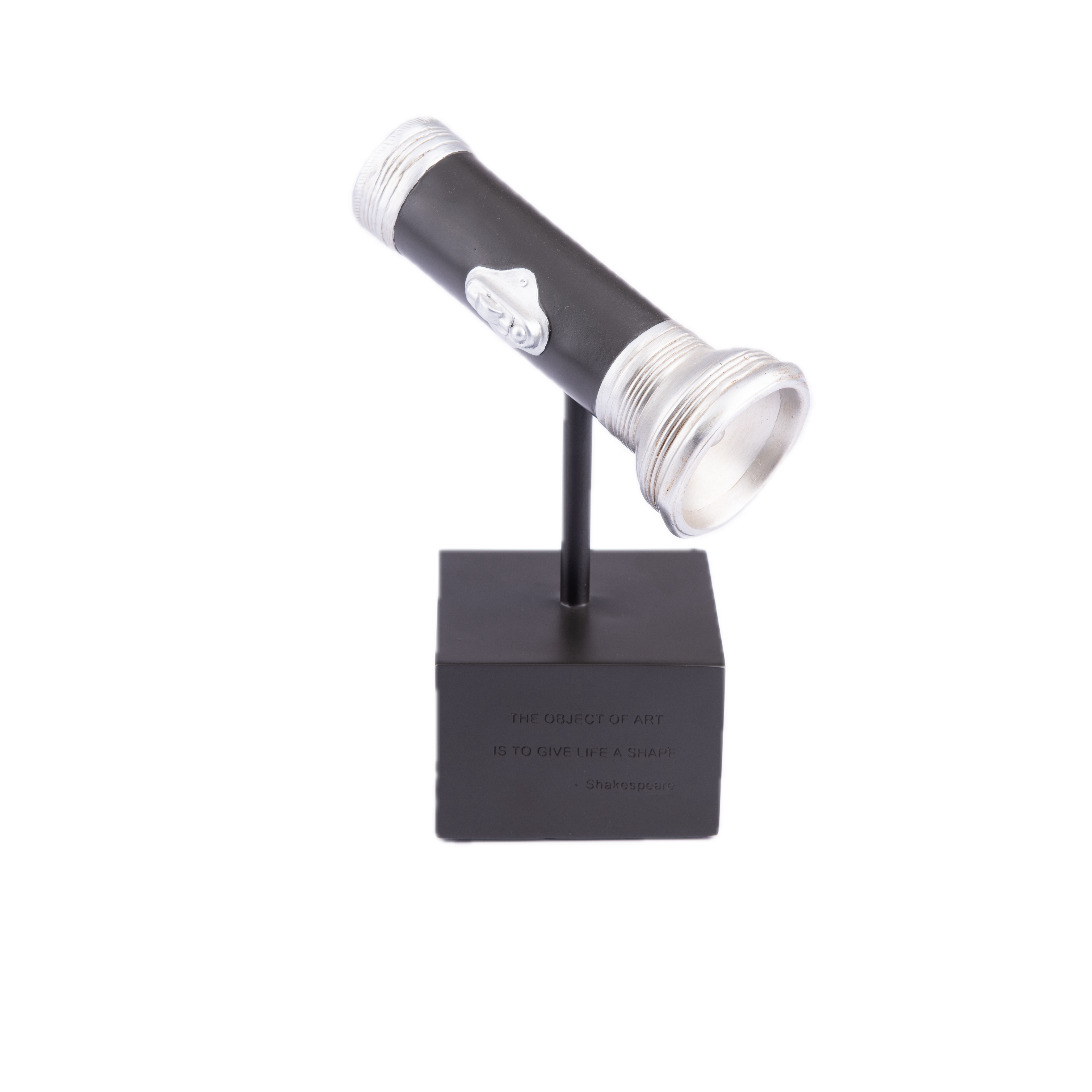 The Merchant Source. Black Flashlight Sculpture