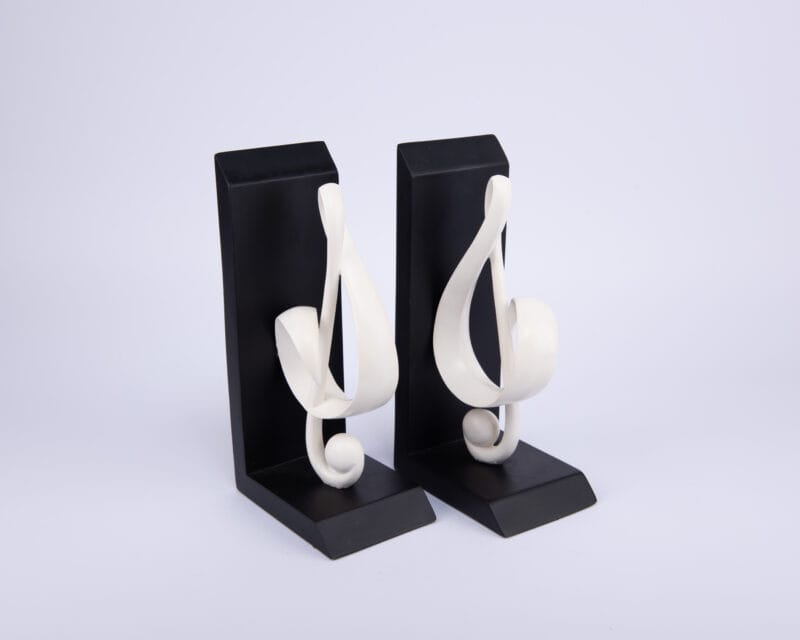 The Merchant Source. Black Bookend Shaped in a Trebel Clef Music Note. Medium Size
