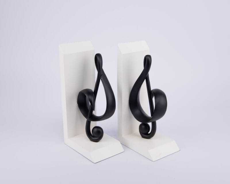 The Merchant Source. White Bookend Shaped in a Trebel Clef Music Note. Medium