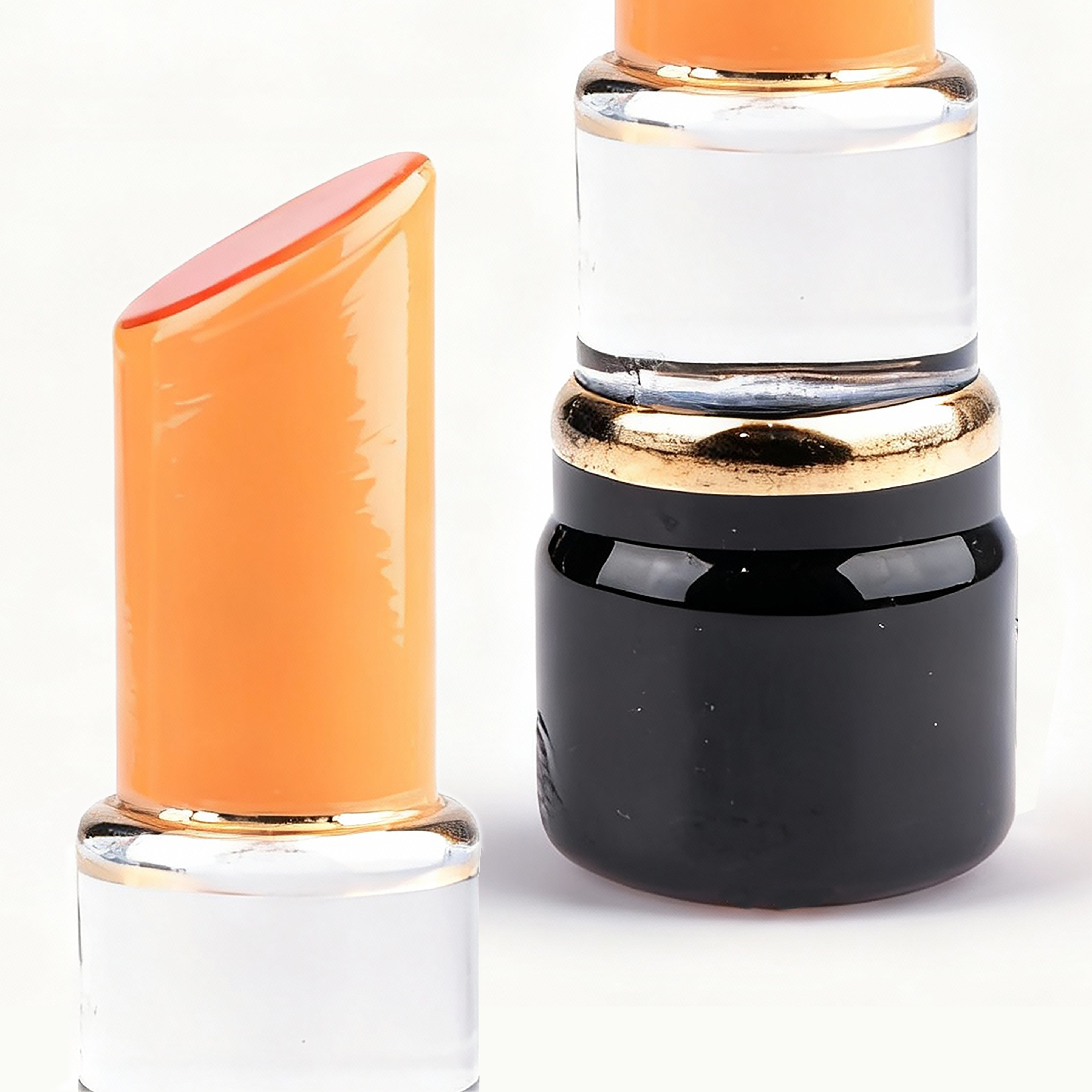 Kosta Boda. Glass Figurine in Orange Lipstick Design. Small Size